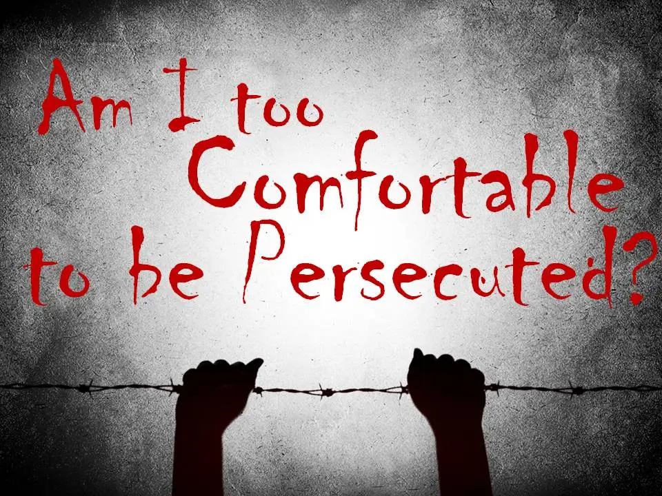 Silhouetted hands gripping barbed wire against a textured background with the red text "am i too comfortable to be persecuted?.