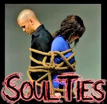 Two people tied back-to-back with a rope under the caption "soulties.