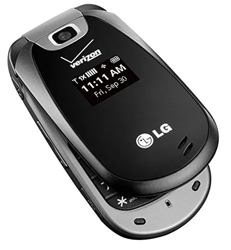 Black lg flip phone displaying the time and date on its external screen.