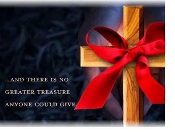 A wooden cross adorned with a red ribbon against a blurred background with an inspirational message.