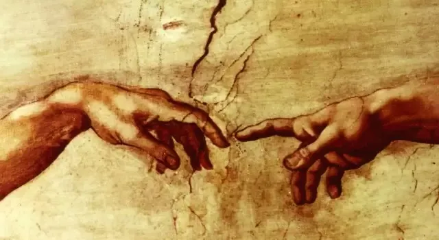 Detail of two hands reaching towards each other with fingers almost touching, from a famous renaissance fresco.