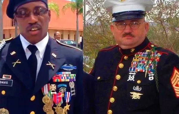 Two men in military uniforms with numerous medals and ribbons displayed on their chests.