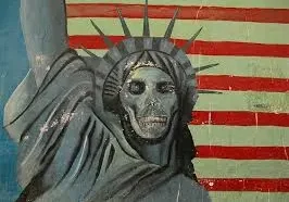 Graffiti art depicting the statue of liberty with a skull face against a striped background.