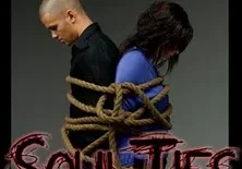 Two people are bound together back-to-back with a thick rope, with the word "soulties" in a stylized font below them.